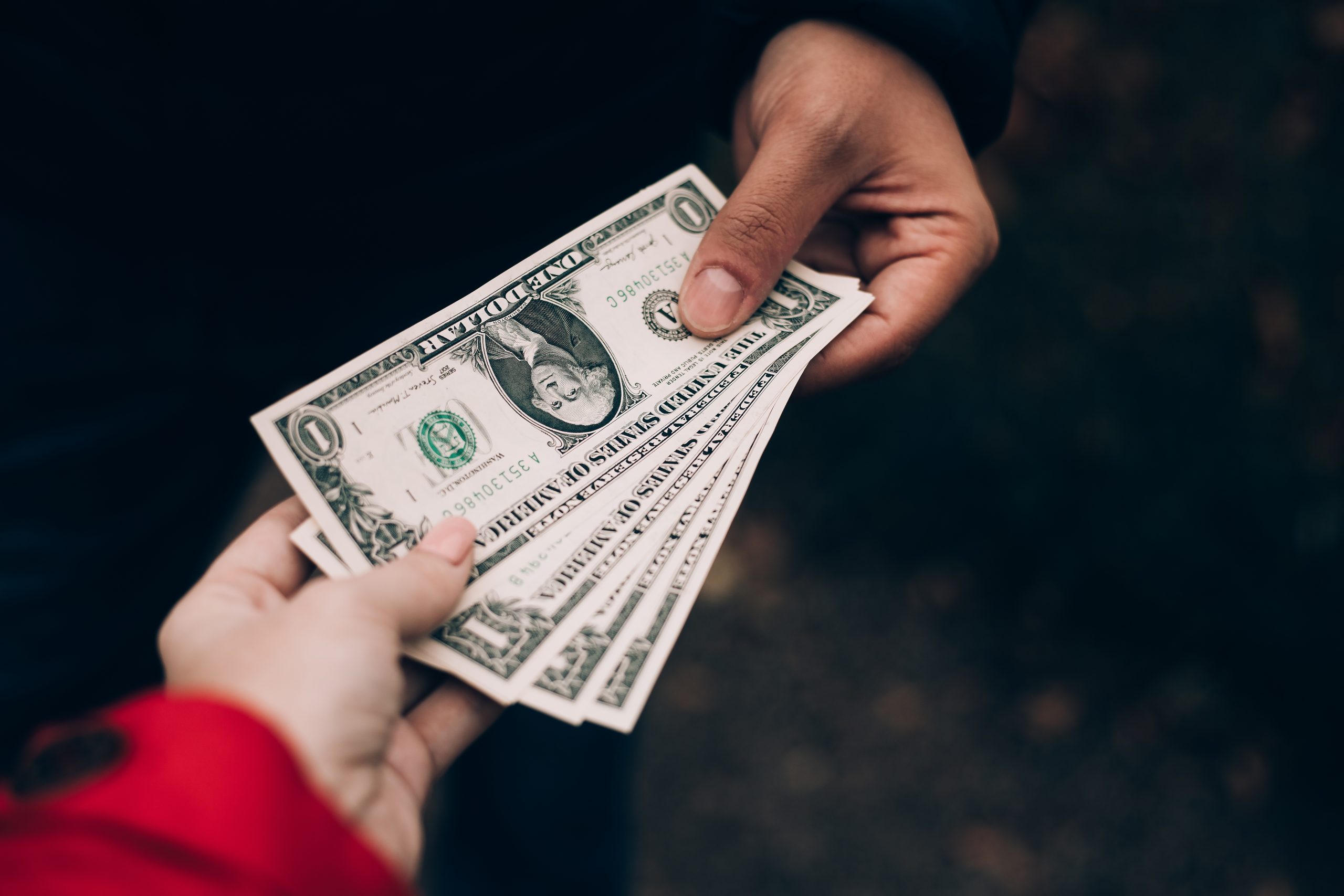 transfer-of-money-from-hand-to-hand-2024-10-17-14-24-43-utc